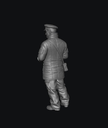 Unpainted 3D resin model of a male traffic warden in uniform, viewed from the back, for scale dioramas.